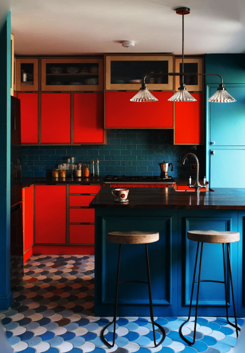 orange cabinets and blue tiles