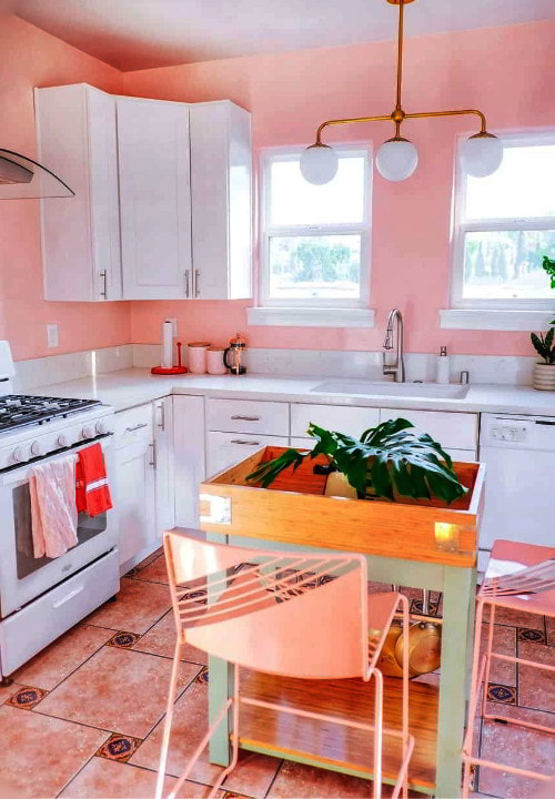 soft pink kitchen color with white appliances