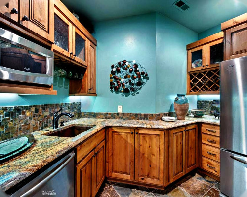 turquoise with light wood cabinets